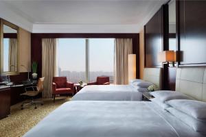 Cama o camas de una habitación en JW Marriott Hotel Shanghai Changfeng Park