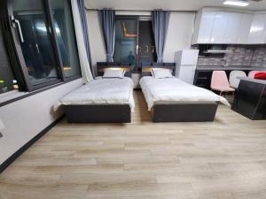 A bed or beds in a room at Unseo Station 10mins - Max 6pax, BBQ