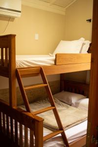 Poschodová posteľ alebo postele v izbe v ubytovaní Chalé 31