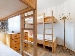 A bed or beds in a room at Tauernlodge Carpe Diem