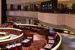 an overhead view of a restaurant with tables and chairs at Sheraton Fuzhou Hotel in Fuzhou