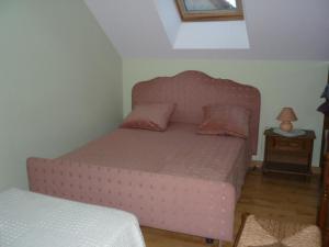 Tempat tidur dalam kamar di Gîte Le Bailleul, 3 pièces, 6 personnes - FR-1-410-344