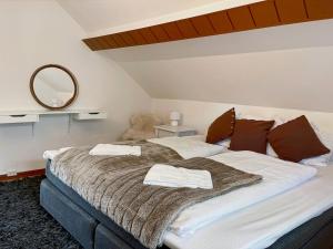 A bed or beds in a room at Unique 3bed Rooms - Generous Terrace - Central Stavanger