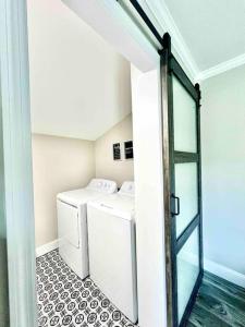 a laundry room with a washer and dryer at *The Gem* Stylish 2 Bedroom 1 Bathroom Newly Renovated in Ladson