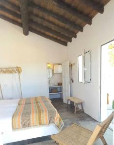 Postel nebo postele na pokoji v ubytování Fonte Freixo, em Borba, Alentejo