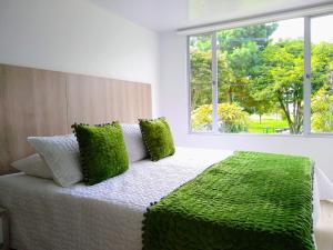 Postel nebo postele na pokoji v ubytování FEDERMAN PARK HOTEl