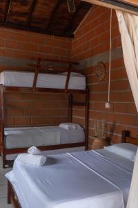Voodi või voodid majutusasutuse Hotel Katamaran toas