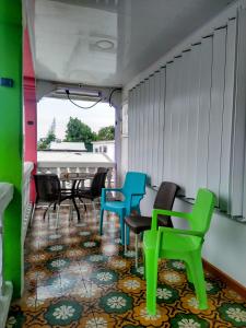 Posezení v ubytování Mr. Tenloy's Place + 12 fotografií