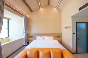 Letto o letti in una camera di Enjoy Hot Spring Villa