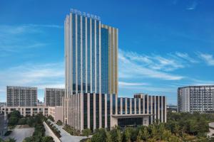 合肥合肥包河福朋喜来登酒店的城市中一座高层建筑的效果图