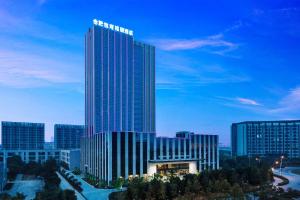 a rendering of a tall building in a city at Four Points by Sheraton Hefei, Baohe in Hefei