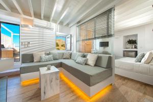 A seating area at Lindos Allure Villa with Jacuzzi and Acropolis view!!!