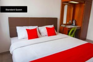 Postel nebo postele na pokoji v ubytování Hotel Kristal, Keningau + 6 fotografií