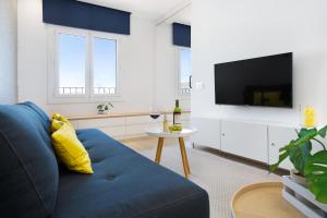 Телевизор и/или развлекательный центр в Stay U-nique Apartments Rambla Catalunya III