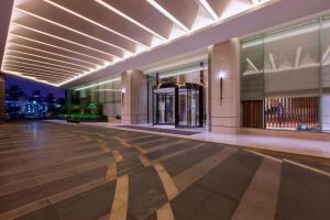 an empty lobby of a building with a dance floor at The Westin Xiamen in Xiamen