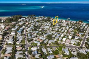 an aerial view of a city with houses and the ocean at Minnow 2 Villa in Anna Maria