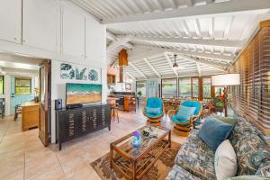 a living room with a couch and a table at International Colony Club 34 in Lahaina