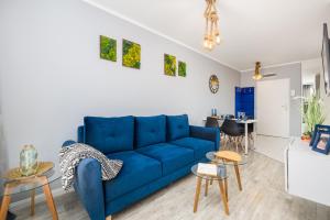 Posedenie v ubytovaní Kapitański Mostek Apartments Kołobrzeg by Noclegi Renters