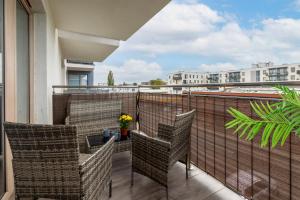 Balkón alebo terasa v ubytovaní Kapitański Mostek Apartments Kołobrzeg by Noclegi Renters