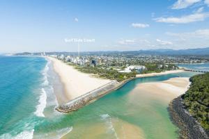 an aerial view of a beach and the ocean at Surfside Court - Hosted by Burleigh Letting in Gold Coast