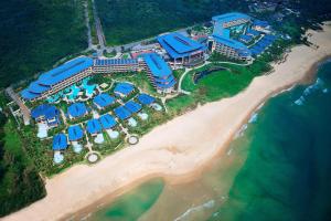 an aerial view of a resort on the beach at The Westin Shimei Bay Resort in Wanning