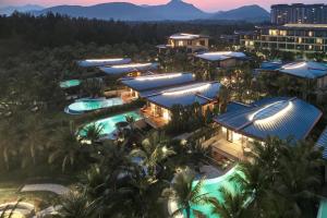 an aerial view of the resort at night at The Westin Shimei Bay Resort in Wanning