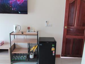 Kuchyň nebo kuchyňský kout v ubytování Sunrise Island Homestay