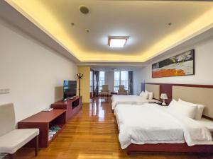 Televisyen dan/atau pusat hiburan di Guangzhou Zhicheng Leader Tour International Apartment-The Legend Building-FREE SHUTTLE BUS FOR CANTON FAIR-1mins to Line5 STN
