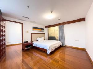 Katil atau katil-katil dalam bilik di Guangzhou Zhicheng Leader Tour International Apartment-The Legend Building-FREE SHUTTLE BUS FOR CANTON FAIR-1mins to Line5 STN