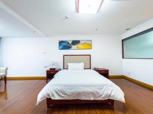 Katil atau katil-katil dalam bilik di Guangzhou Zhicheng Leader Tour International Apartment-The Legend Building-FREE SHUTTLE BUS FOR CANTON FAIR-1mins to Line5 STN