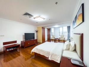 Televisyen dan/atau pusat hiburan di Guangzhou Zhicheng Leader Tour International Apartment-The Legend Building-FREE SHUTTLE BUS FOR CANTON FAIR-1mins to Line5 STN
