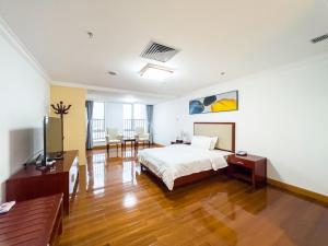 Katil atau katil-katil dalam bilik di Guangzhou Zhicheng Leader Tour International Apartment-The Legend Building-FREE SHUTTLE BUS FOR CANTON FAIR-1mins to Line5 STN