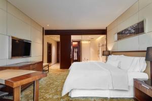 TV a/nebo společenská místnost v ubytování The Westin Tianjin