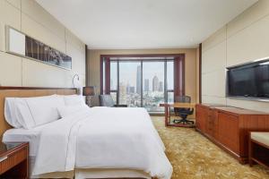 TV a/nebo společenská místnost v ubytování The Westin Tianjin