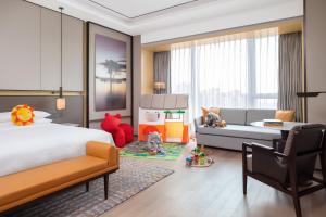 Letto o letti in una camera di Sheraton Shanghai Fengxian