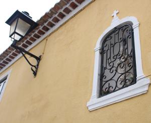 a street light on the side of a building at Sintra1012 Boutique Guesthouse in Sintra