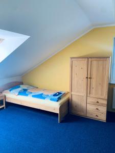 Postel nebo postele na pokoji v ubytování hotel Sádek