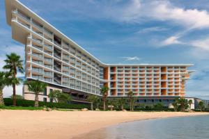 a view of the hotel from the beach at Le Méridien Xiaojing Bay in Huizhou