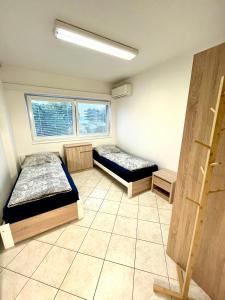 Postel nebo postele na pokoji v ubytování Ubytování Pardubice Trnová