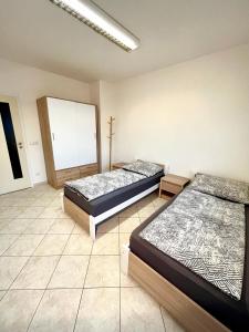 Postel nebo postele na pokoji v ubytování Ubytování Pardubice Trnová