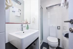 Ein Badezimmer in der Unterkunft Hotel Plavi Plava Laguna
