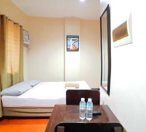 Letto o letti in una camera di Hotel California Suite
