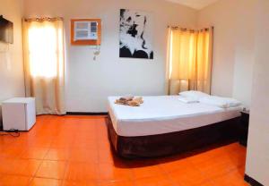 Letto o letti in una camera di Hotel California Suite