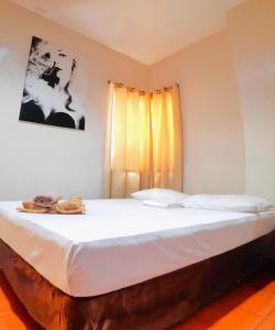Letto o letti in una camera di Hotel California Suite