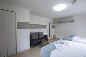 Krevet ili kreveti na sprat u jedinici u okviru objekta Kiyomizu Sannenzaka Home in Kyoto - Vacation STAY 33812v