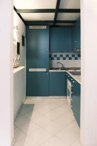 A kitchen or kitchenette at ComeCasa Grazioso Loft in Crocetta near Mangiagalli