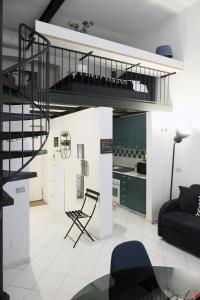 A kitchen or kitchenette at ComeCasa Grazioso Loft in Crocetta near Mangiagalli