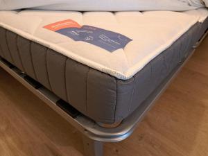 Postel nebo postele na pokoji v ubytování Le Bulotier