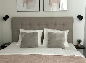 Postel nebo postele na pokoji v ubytování Esplanaadi Residences