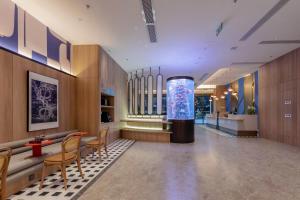 Posezení v ubytování Holiday Inn Express Shanghai Hongqiao Linkong by IHG + 32 fotografií